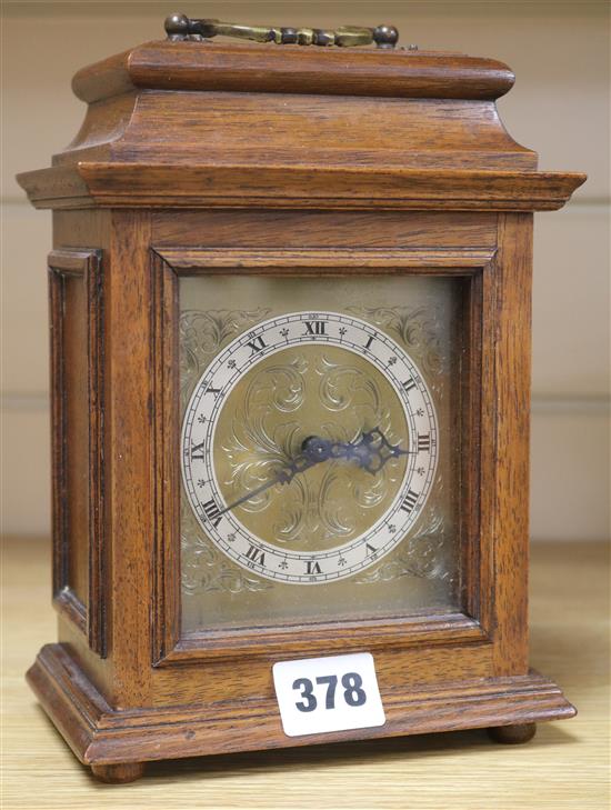 An oak mantel clock 8.5ins